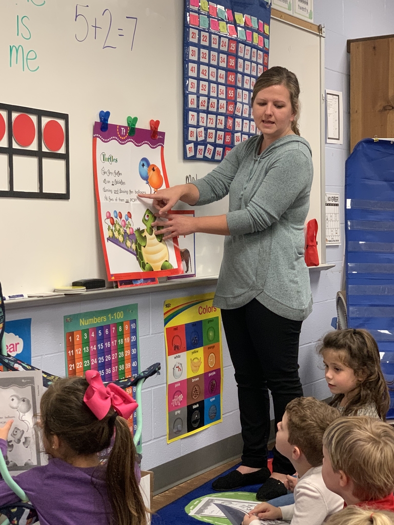 Mrs. Wendy Nichols has her kindergarten students reading Turtles poem.